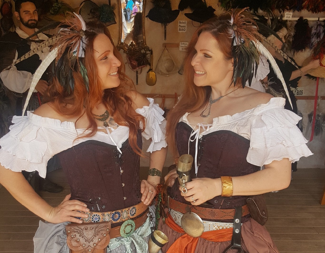 Matched pair of beautiful Fey sweep barrettes being shared by two Ren Fest friends, create a sort of mirror image.